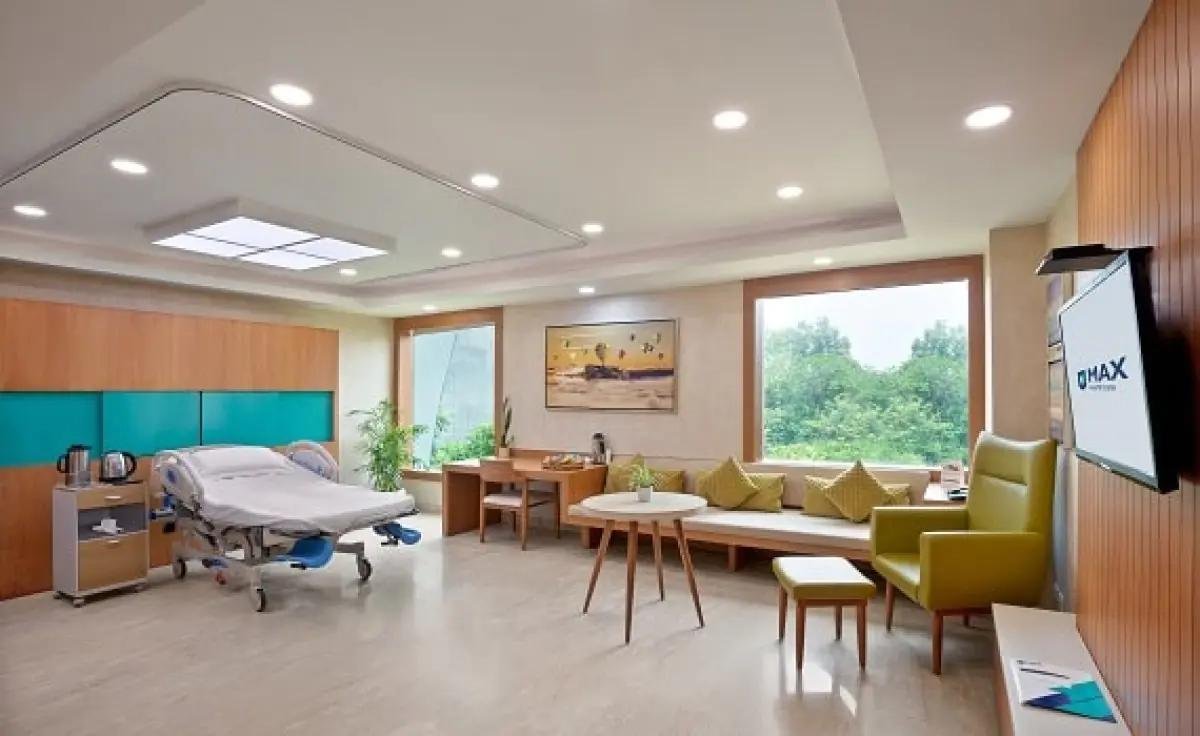 Spacious suite with lounge seating and garden view